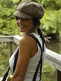 This gorgeous brunette babe strips naked at a pier to show her nice tits and ass