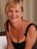 This granny is already 56 years old and she still poses naked like a little slut