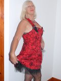 Old bustys black see-through lingerie looks awesome together with her stockings