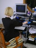 Office girl gets bored with typing. She strips and shows her beautiful body in the tight bodysuit!
