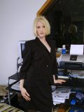 Office girl gets bored with typing. She strips and shows her beautiful body in the tight bodysuit!