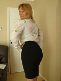 Naughty blonde housewife just loves to flaunt her bare massive boobs