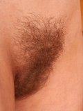 Pretty mature lady strips off her bf shirt! She then stretches her body sexily for more fun.