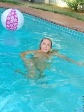 Mouthwatering old timer Luna takes a plunge into the swimming pool all naked