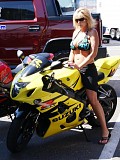 Slutty busty blonde loves to play with two enormous dildos in her wet pussy at the same time
