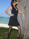 Incredible pictures of a sexy milf Roni posing in a black and red outfit that shows her juicy tits