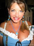 Busty German barmaid flashes her shaved snatch and stuffs a dick in her mouth