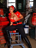 Horny brunette babe loves to work as a mechanic and to flash her giant boobs at work