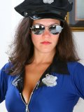Pretty lady dresses up in police costume and she is going to show you how much she likes the stick!