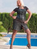 Blond momma Sandy has got black nylon stretching over her hips and large juggies