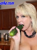 Mommy starts her fetish show with carrots and ends up with a bottle in her cunt