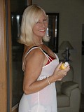 Slutty mature blonde milf shows off her amazing juicy ass in stockings by the pool