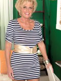 A mature housewife impales herself on a big black cock by going balls deep