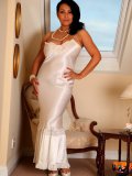Latin mommy with 34GG melons showing off her outstanding heavy curves on camera