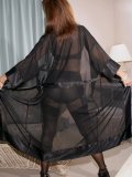 Super hot mature housewife Roni exposes her sexy body on the bed in black lace