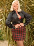 Adventurous stacked mama comes flashing her big tits, stockings and even pussy