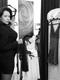 Amazing black and white pictures of a hot milf trying on sexy lingerie and flashing her tits