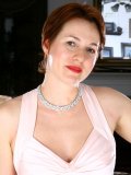 Elegant lady in pink night gown pulls up her dress and reveals her horny pussy and tits!