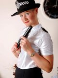 Mature traffic cop slides her rubber club and her panties into her hungry pussy