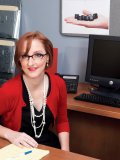 This hot office lady bangs her well-hung and young employee right on her desk