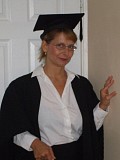 Hot pictures of a sexy mature blonde posing as a grad student and revealing her juicy tits