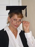 Hot pictures of a sexy mature blonde posing as a grad student and revealing her juicy tits
