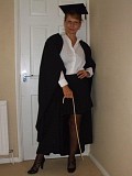 Hot pictures of a sexy mature blonde posing as a grad student and revealing her juicy tits