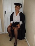Hot pictures of a sexy mature blonde posing as a grad student and revealing her juicy tits