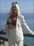 Crazy blonde milf Sandy doesn't mind showing her massive tits in public