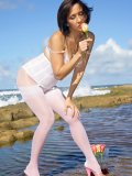Brunette housewife goes wild and shows her juicy shaved pussy in a hot outdoors picture set