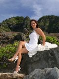 Daring pictures of aroused Roni posing topless outdoors risking to get caught
