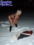 Crazy blonde bitch Alysha makes a dildo out of snow and fucks herself in the middle of a snowy field