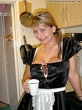 Horny blonde milf can't help playing with her juicy pussy in the kitchen