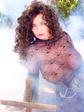 Mature brunette with a sexy body poses for some sexy Halloween pictures